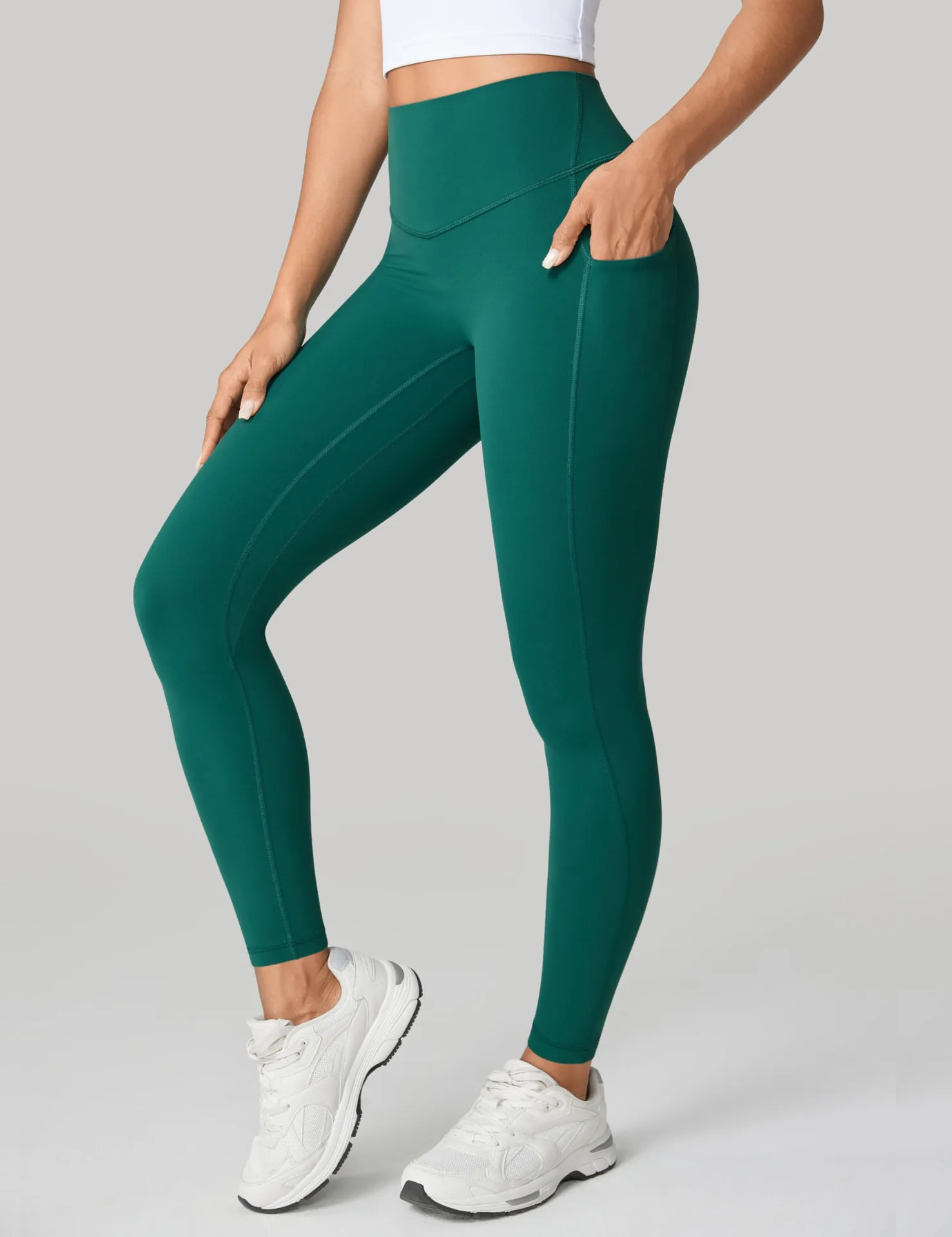 Green UNISSU leggings with side pockets