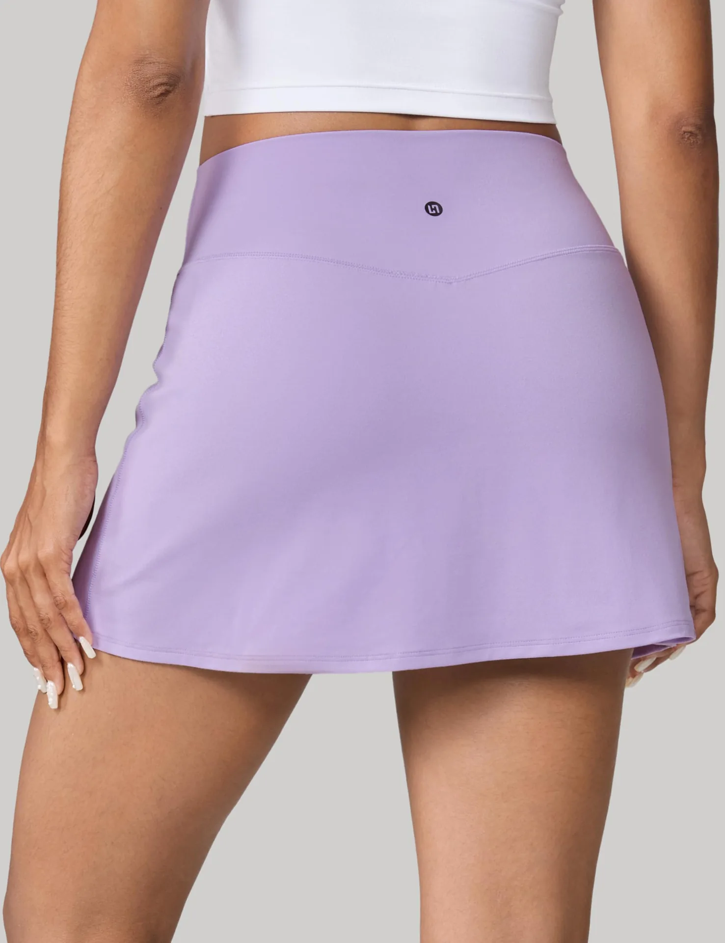 Lilac UNISSU tennis skirt from the back